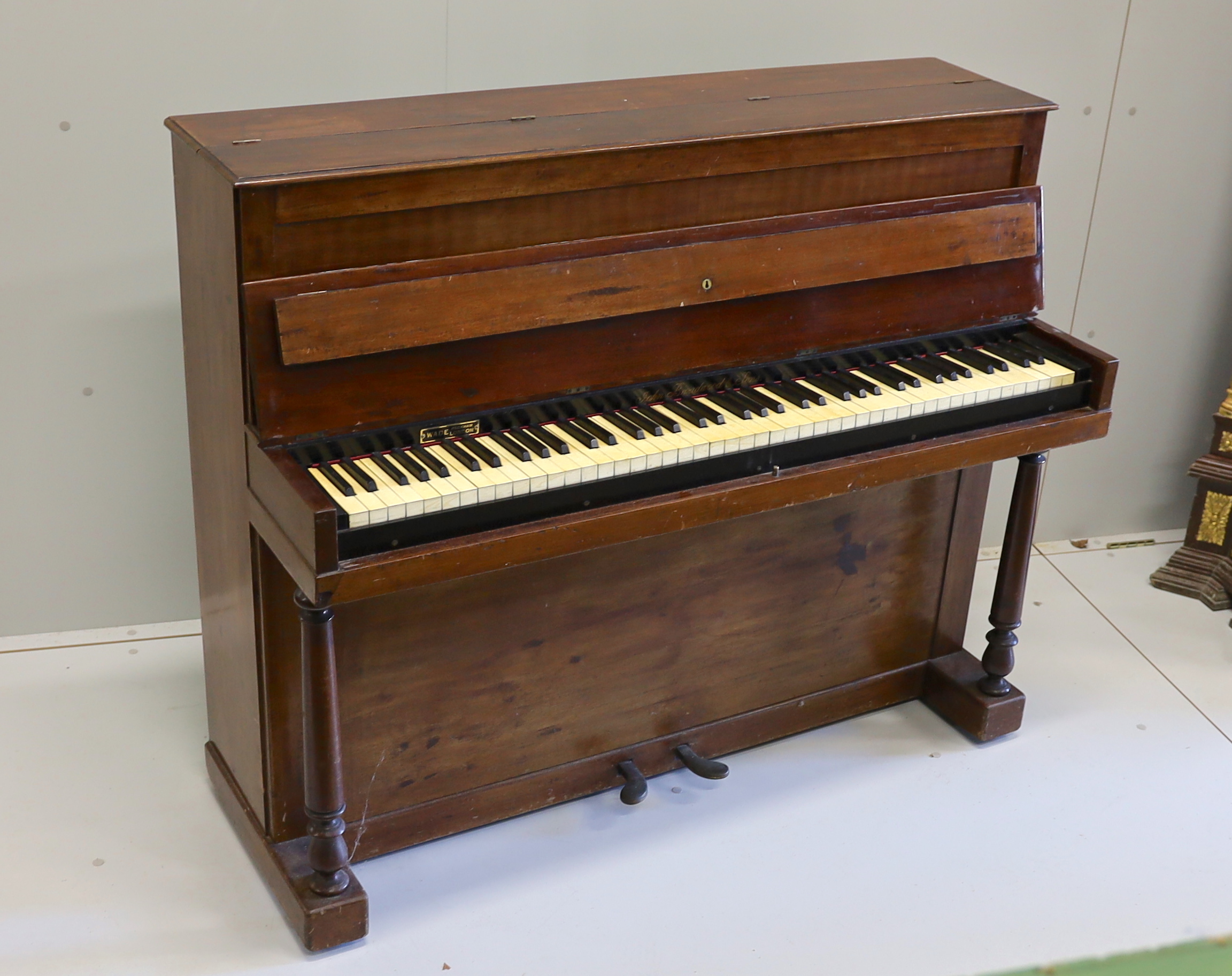 A John Broadwood & Sons upright piano, formerly the property of Sir Arthur Sullivan, a mahogany pianette model no.22 with 82 keys built in 1867